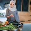 woman cooking | | 10 Makanan Sehat yang Harus Selalu Ada di Dapur